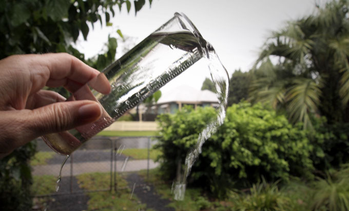 Tipping out the rain guage again  PHOTO: Doug Spowart