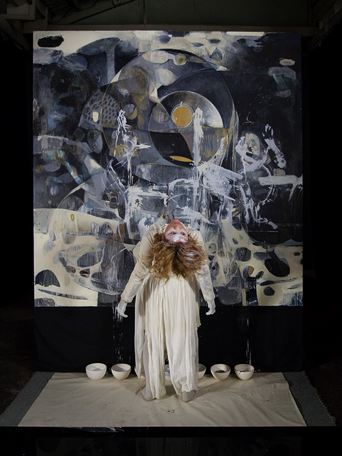 Kirsty Lee and her interaction with the painting   PHOTO Cooper+Spowart