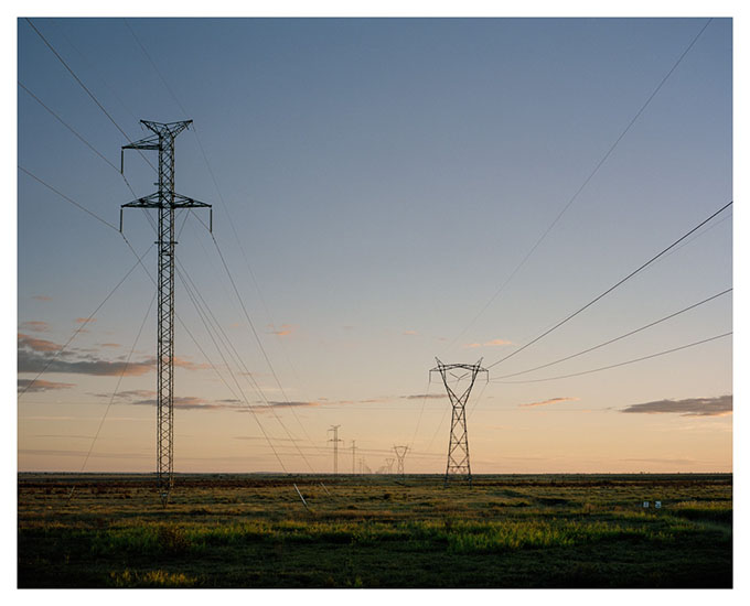 From the 'Transmission' series Coal and electricity are inextricably linked. In the first half of the 20th century, Brisbane’s electricity came from power stations in the city that were fuelled by coal from Ipswich. Now Queensland is part of a complex energy network not only spanning the state and the nation, but as the world’s largest coal exporter, the globe. Powerlines outside Middlemount.