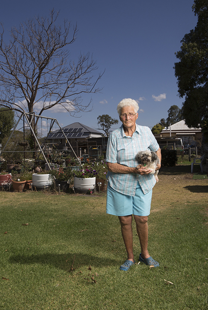 Joyce Coss 83 years old with "Waddles" her Sliky Cross. 63 years living in Warra Warra. Dalby Region. Russell Shakespeare 2013