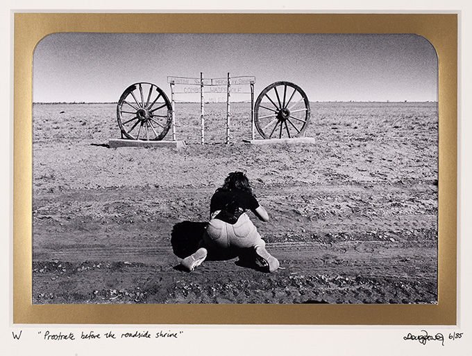 W  Waltzing Matilda. Shown here is a shrine erected by the McKinlay Shire Council to mark the location where Banjo Paterson wrote the Australian anthem about a swagman's demise on stuffing a jumbuck (sheep) in his tuckerbag. Combo Waterhole near Kynuna, Queensland.