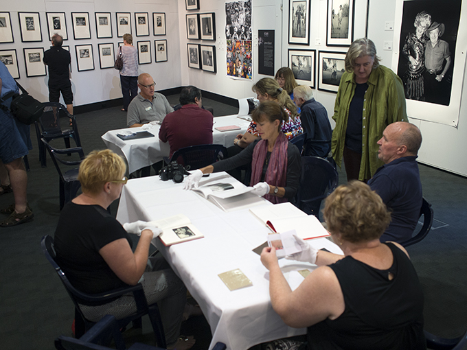 Looking at the books – Cobb+Co Museum, Toowoomba