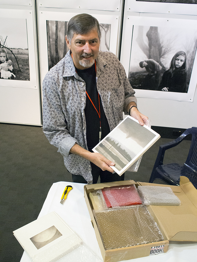 Doug Spowart opens the box