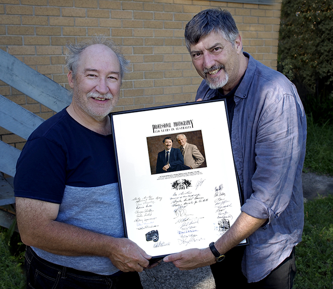 Doug presenting Sandy with a replacement 150th Anniversary Plaque