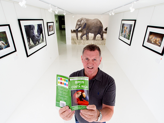 John Wiseman reading up on Costa Rican birds