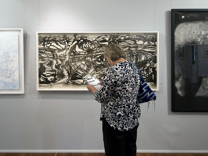 Vicky disappearing into Wooli Escarpment 2014 by Andrew Tompkins