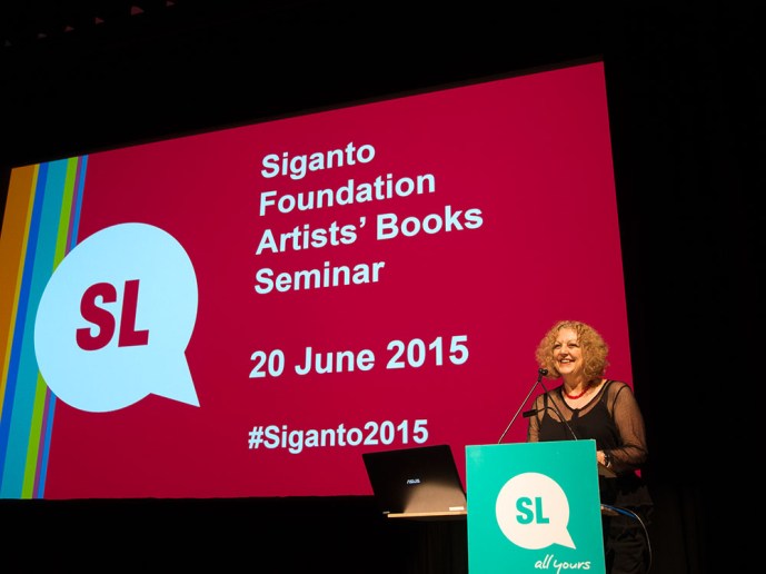 State Librarian Janette Wright welcomes guests to the seminar