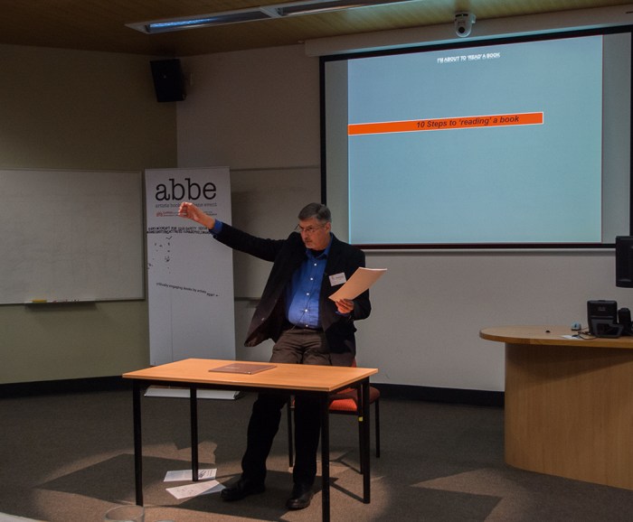 Doug Spowart performs his lecture 'I'm about to 'read' a book'