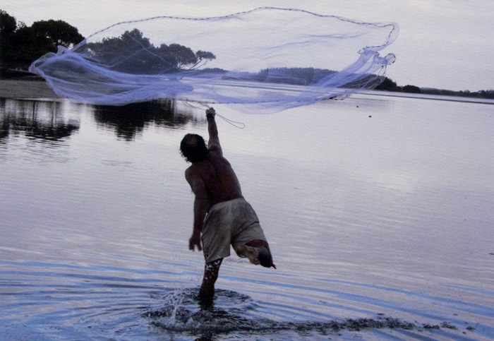 PHOTO: Michael Aird. "Paul Wright casting net South Stradbroke Island 2007"