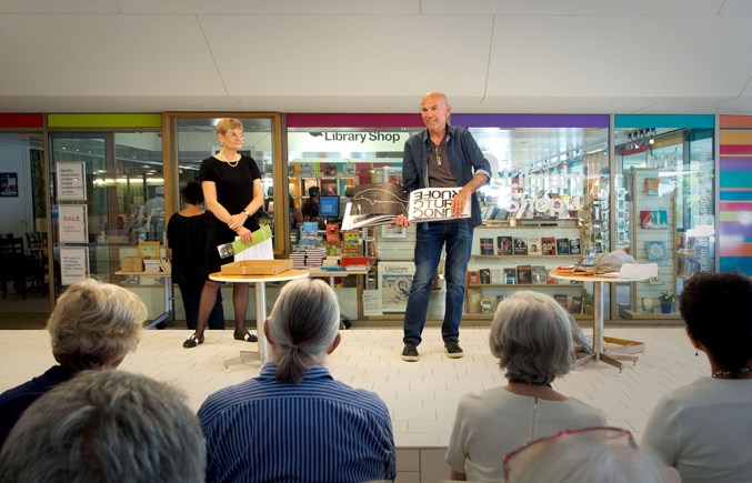 Clyde McGill performing his artists' book Looking for Place