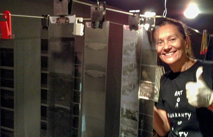 Irena processing film in the darkroom