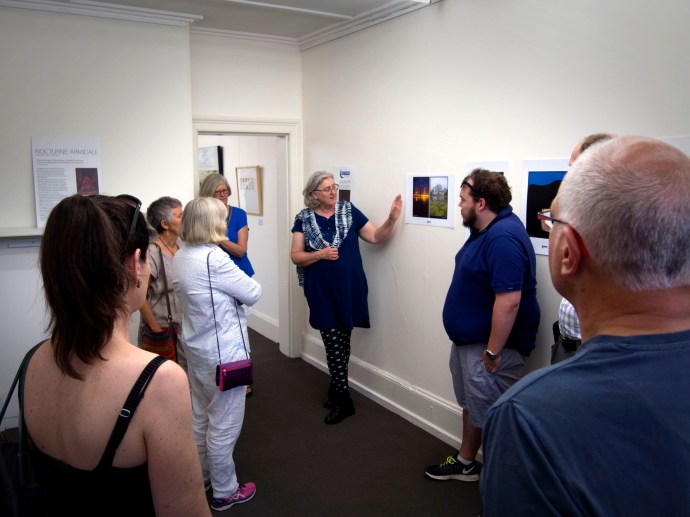 Vicky presenting a floortalk about the Nocturne show