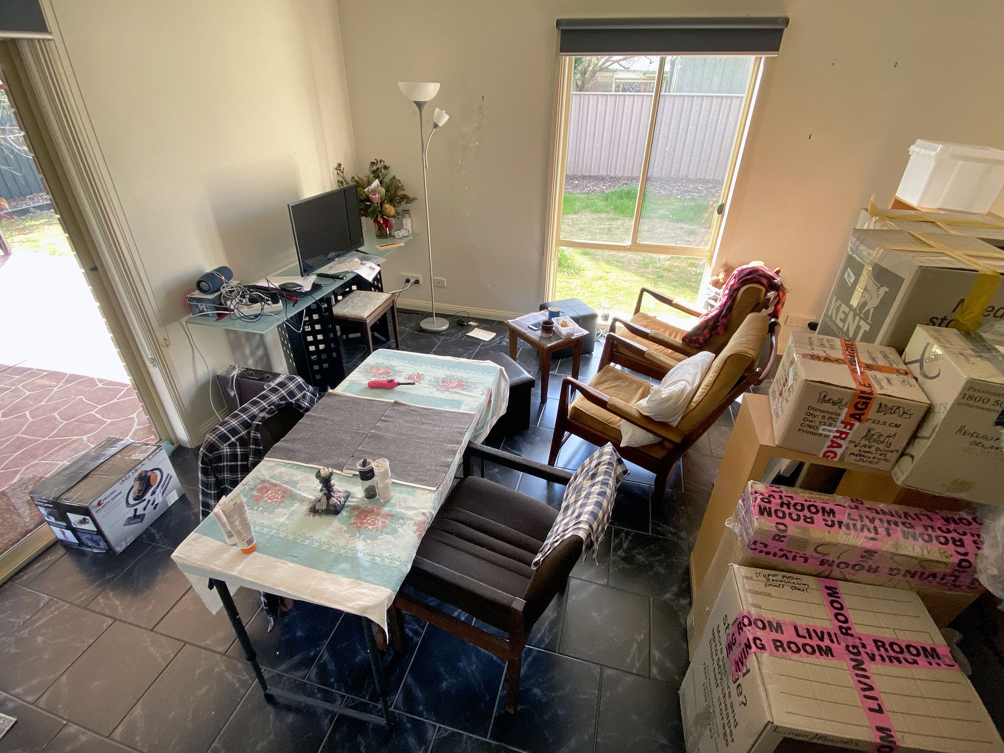 The Living Room + boxes to unpack in quarantine ...