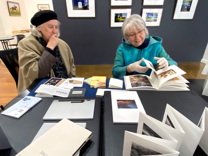 Looking at books with Maggie